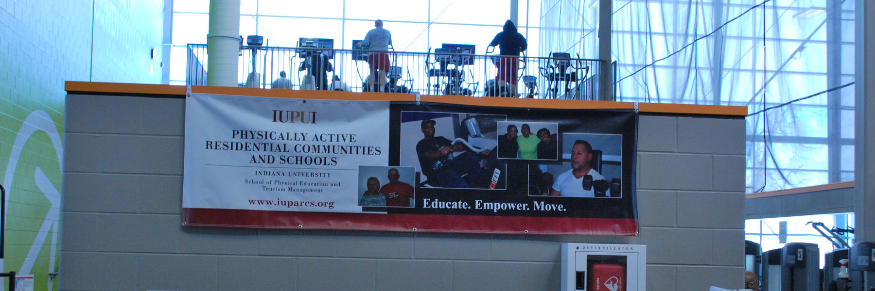 IUPUI Banner about physical activity and wellness located in a gym